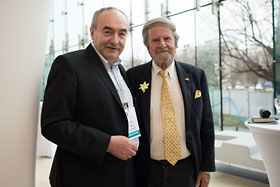 Tad Taube, Chairman of the Taube Foundation for Jewish Life & Culture, wearing a daffodil at the 70th anniversary of the Warsaw Ghetto Uprising ceremonies at the Museum of the History of Polish Jews, with Zygmunt Stepinski, Deputy Director, Educational and Cultural Programming.